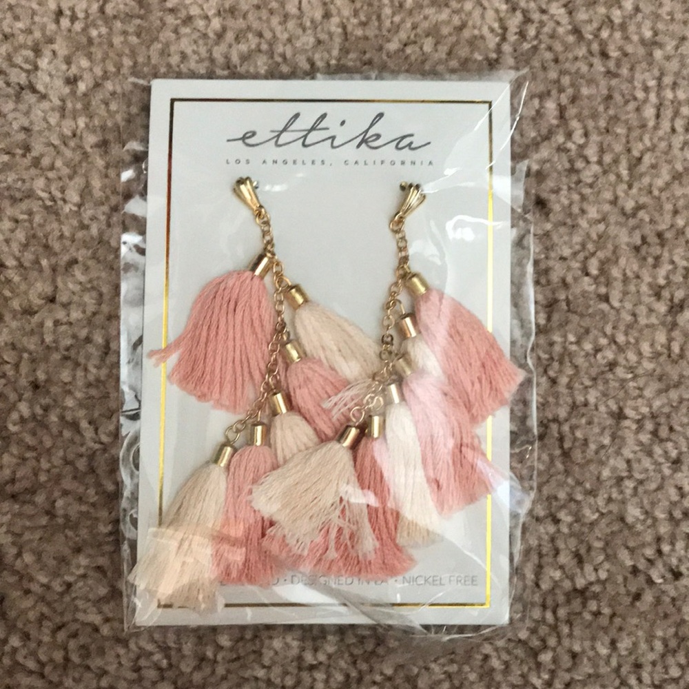 Never worn Ettika dangle earrings